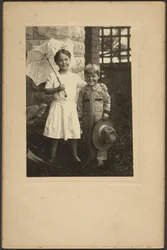 Portrait of a Girl with Umbrella and a Boy with Hat