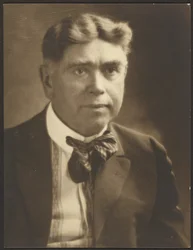 [Portrait of a Man with Striped Tie]
