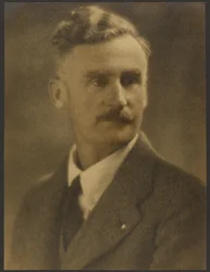 Portrait of a Man with White Lapel Pin