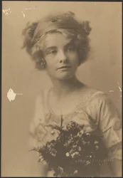[Portrait of a Woman Holding a Bouquet with Fern]