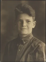 [Portrait of a Young Boy in Button-Up Shirt]