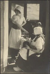 Two Women Dressed in Dutch Costumes