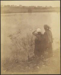 Two Women by a Lake