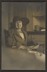 Woman Holding Letter