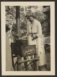 Woman Using Outdoor Stove