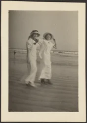[Woman in White Dresses on Beach]