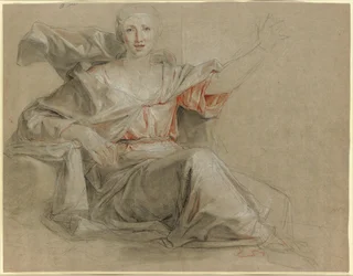A seated woman, her left arm raised