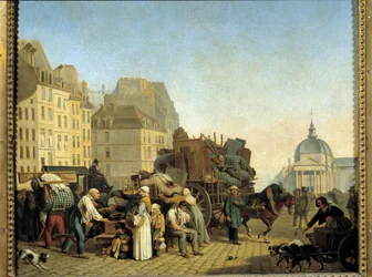 Parisian replacements during a change of accommodation load a cart with business and furniture in a street in Paris