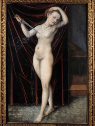 Lucretia gives herself death. The suicide of Lucretia, Roman lady of the 6th century BC. Painting by Lucas Cranach (1472-1553), 16th century. Besançon, Museum of Fine Arts