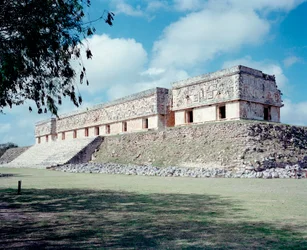 Precolombian civilization: view of the site of Uxmal ancient Maya capital, Puuc style. North Yucatan 600-900 AD: pyramid of the diviner. Mexico