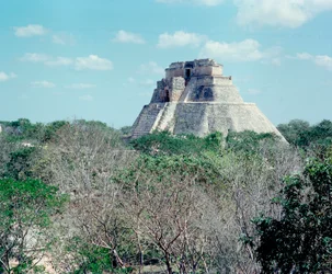 Precolombian civilization: view of the upper temple on the site of Uxmal ancient Maya capital, Puuc style. North Yucatan 600-900 AD. Mexico