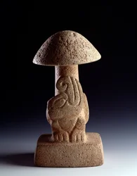 Pre-Columbian art, Maya civilization, Preclassic period: basalt sculpture in the shape of a fungus with a representation of a stylized serpent. From Kaminaljuyú, Guatemala. Dimensions 28.5 x width 15.8 cm. Guatemala, National Museum of Archaeology and