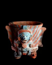 Pre-Columbian Art, Mayan Civilization, Postclassical Period: Tripod Vase with Clay Incense Decorated with a Head. From Nebaj, Quiche, Guatemala. Guatemala, Museo Nazionale di Archeologia e Etnologia