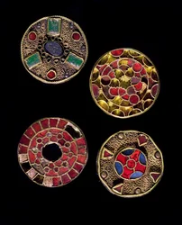 Archaeology of the Middle Ages. Barbarian art of Gaul: fibules in gold silver works in filigree, polychrome style. France, Merovingian period. Strasbourg, Musee d