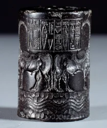 Mesopotamia: Cylindrical Seal in Black Marble in the Name of the Divine Sharkali-Sharri
