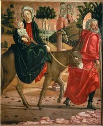 Flight to Egypt. Saint Joseph leading the donkey with Saint Mary and child