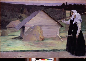 Summer. Two women carrying their rake, in the evening after field work, walk in front of haystacks and wooden huts. Painting by Mikhail Vasilyevich Nesterov