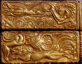 Lion hunting deer in a forest (detail)