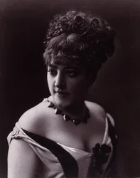 Portrait of a Woman Wearing a Necklace with Heart-Shaped Pendants