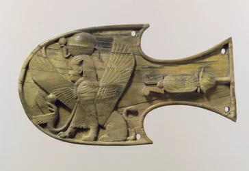 Horse blinker carved in relief with a seated sphinx, c.8th century BC