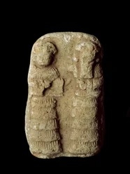Sumerian civilization: couple of gods on the throne. Terracotta sculpture. Neo-Sumerian period. Baghdad, National Iraq Museum