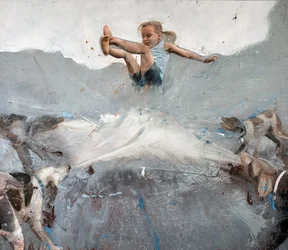 Girl jumping with dogs
