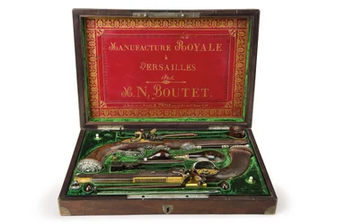 A pair of silver-mounted rifled flintlock pistols, Versailles