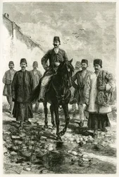 The governor of Kashan (or Kachan, in Tehran province, present-day Iran) rides a black horse and his suite is on foot. Engraving by Tofani, from a photograph, to illustrate the account 