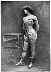 The Actress Polar Posing Beside a Barbarous Organ, Wearing the Costume She Wore in the Piece 