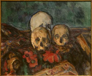Three skulls on an oriental rug