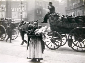 A female newspaper seller, London