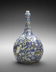 Lobed Bottle with Figure and Flowers, mid 17th century