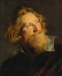 Portrait of a bearded man with a white collar and gold chains
