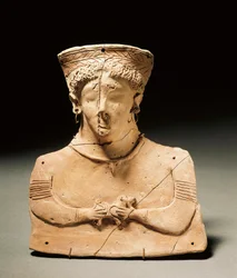 Phoenician art: terracotta statuette representing the goddess Tanit, pierced ears and nose. 3rd-2nd century BC. Madrid, Museo Arqueológico Nacional
