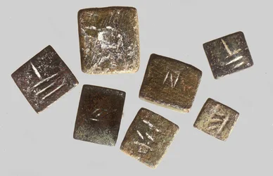 Weights inscribed with their individual weight