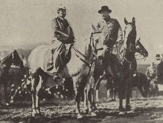 Kaiser Wilhelm II of Germany and US President Theodore Roosevelt watching the German Army on manoeuvres