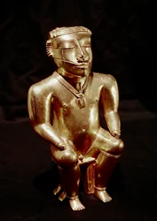 Pre-Columbian art, Quimbaya civilization: statuette of man sitting in gold