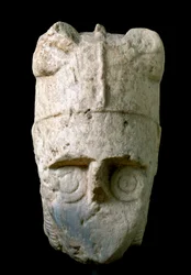 Head of an archer with a horned helmet (miles cornutus), from Monte Prama, conserved at the National Archeological Museum of Cagliari