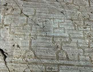 Prehistory, Camunni civilization, rock art: a grave rock of stylized representations of characters known as 