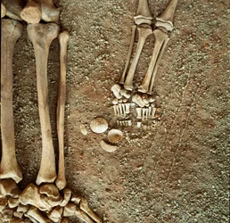 Prehistory: double burial of adults and children. Detail view of the grave goods: at the child
