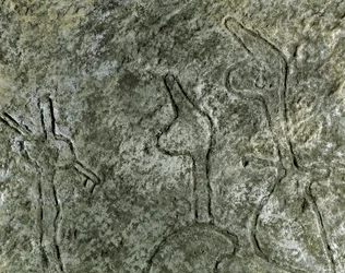 Prehistory, rock art: petroglyph of a hunting scene representation. Neolithic, Stone Age. Baku, Azerbaijan State Religion History Museum