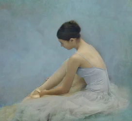 Ballerina Tying Pointe Shoes