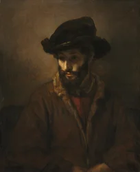 A Bearded Man Wearing a Hat