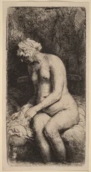 Nude Seated on a Bench with a Pillow