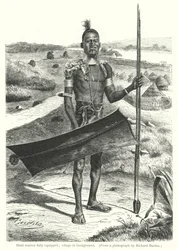 Shuli warrior fully equipped; village in background