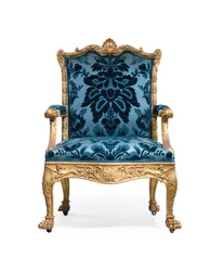 One of a pair of George III giltwood armchairs