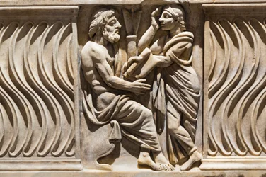 Decoration on a sarcophagus, image of a philosopher and muse