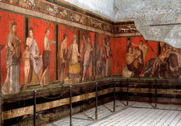 Initiation into the Worship of Dionysus: a Young Man Is Introduced to Worship, Reading the Ritual, and a Little Boy Makes an Offering. 1st Century BC. Fresco from the Villa of the Mysteries in Pompeii, Italy