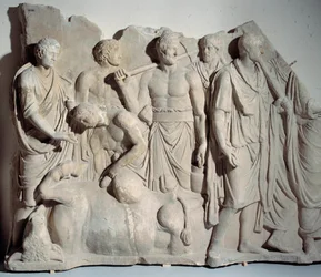 Marble relief from Forum Trajan: scene of haruspice consulting the bowels of a bull with priest and lictors