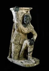 Persian servant statue kneels